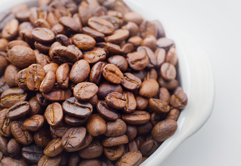 roasted coffee beans on white background space modern style.