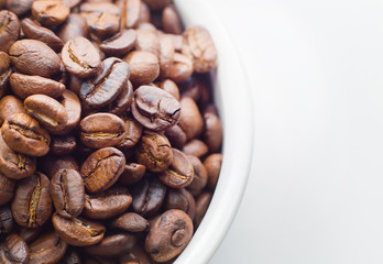 roasted coffee beans on white background space modern style.