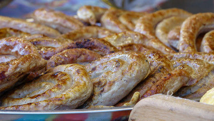 Grilled sausages on the home