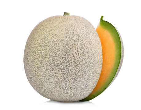 whole cut of japanese melons, orange melon or cantaloupe melon with seeds isolated on white background