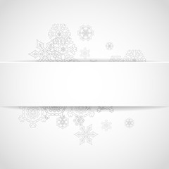 Silver snowflakes frame on white paper background. Christmas and New Year frame for gift certificate, ads, banners, flyers. Falling snow with glitter silver snowflakes for party invite