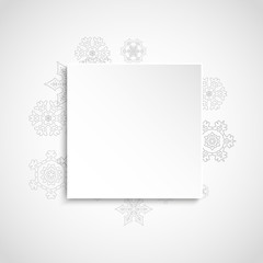 Silver snowflakes frame on white paper background. Christmas and New Year frame for gift certificate, ads, banners, flyers. Falling snow with glitter silver snowflakes for party invite