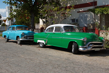 Old cars in Cienfuegos in Cuba
