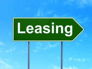 Business concept: Leasing on green road highway sign, clear blue sky background, 3D rendering