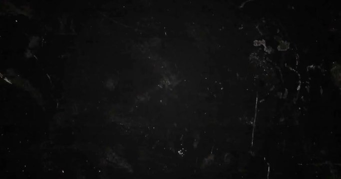 old film grunge on black background realistic flickering, analog vintage TV signal with bad interference, static noise background, overlay ready