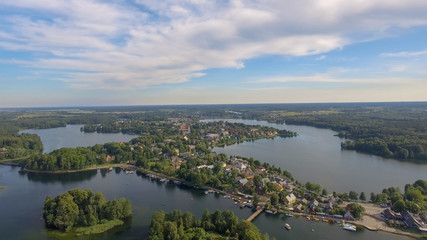 Lakes and vegetation at sunset, aerial view of Estonia