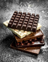 Dark, white and chocolate with nuts.