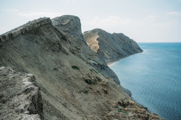 Scenic calm seashore with Crimean mountains ridge, Ukraine, May 2013