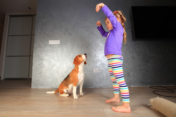 Girl training dog