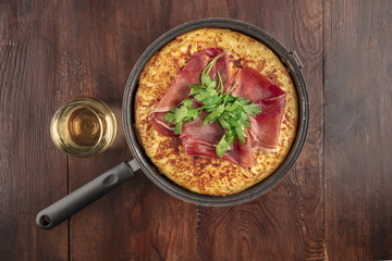 Overhead photo of Spanish tortilla with copy space