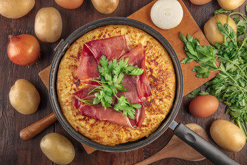 Spanish tortilla, shot from above with ingredients
