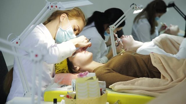 master of eyelash extensions is preparing for the procedure for eyelash extension