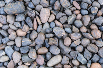 Stone pebbles texture or stone pebbles background for interior design business. exterior decoration and industrial construction idea concept design. Stone pebbles motifs that occurs natural.