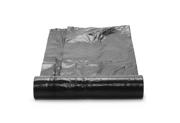 Black roll of plastic garbage bags isolated on white