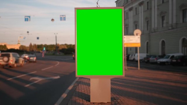 Billboard with a Green Screen on the Busy Roadway.