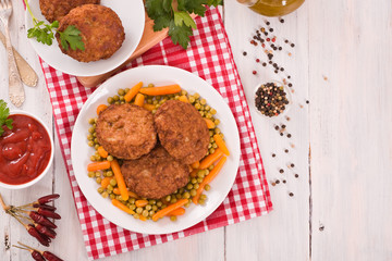 Meatballs on white dish. 