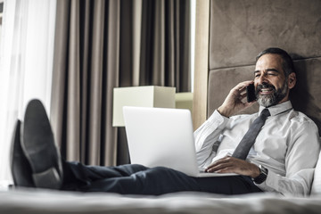 Businessman at Hotel Room
