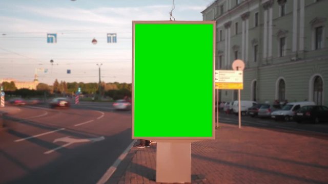 Time Lapse . Billboard with a Green Screen on the Busy Roadway.