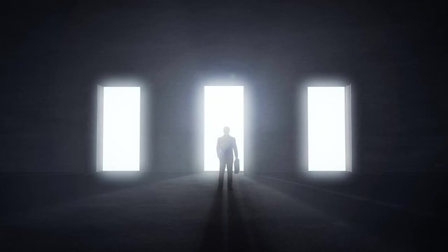 Man standing at three opening glowing doors in darkness, light rays coming trough. Decision concept