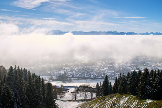 Peissenberg, Germany, under a thick layer of fog. View from the mountain