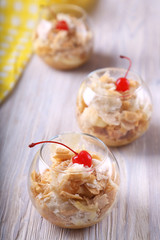 Napoleon dessert in glass bowl with cherry