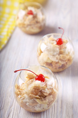 Sweet and tasty dessern Napoleon with cherry. Toned photo