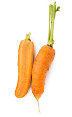 Ripe orange carrot half isolated at white
