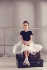 The little girl as balerina dancer sitting at studio © master1305