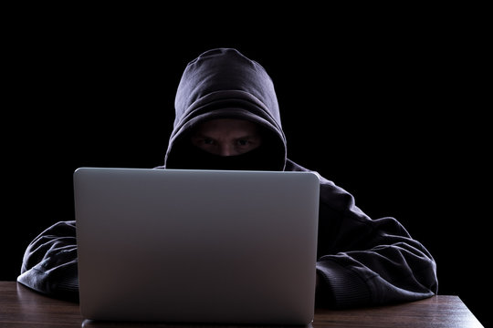 Anonymous hacker in the dark