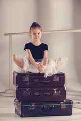 The little girl as balerina dancer sitting at studio © master1305