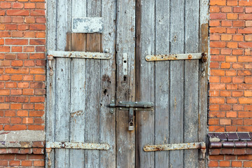 Old wooden door. Grunge background texture for design