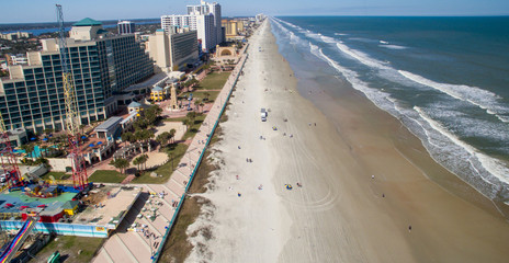 Fototapeta na wymiar DAYTONA BEACH, FL - FEBRUARY 2016: City and beach aerial skyline. Daytona Beach attracts 5 million tourists every year