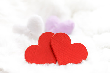 Fototapeta premium Red wooden heart with white background.