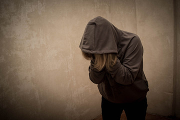 Hopeless drug addict going through addiction crisis, portrait of young person with substance...