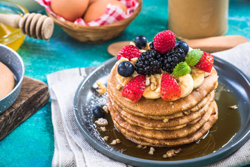 Perfect pancakes with fresh forest fruits
