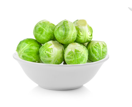 Brussel Sprouts in a bowl on white background