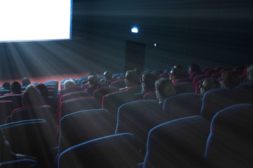 viewers watch a 3D movie - obrazy, fototapety, plakaty