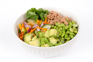 Buddha bowl of mixed vegetable with avocado and tuna