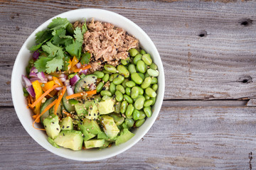 Buddha bowl of mixed vegetable with avocado and tuna