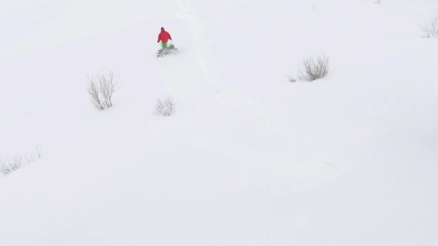 Aerial view footage of skier riding at mountain, winter