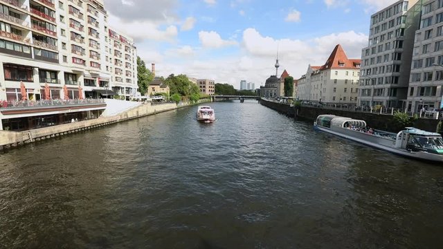 Berlin city skyline at Museum island and Berlin TV Tower, Tourist ship on River Spree, Bode Museum on Museum Island with TV Tower in background, Germany, Berlin, September, 2017