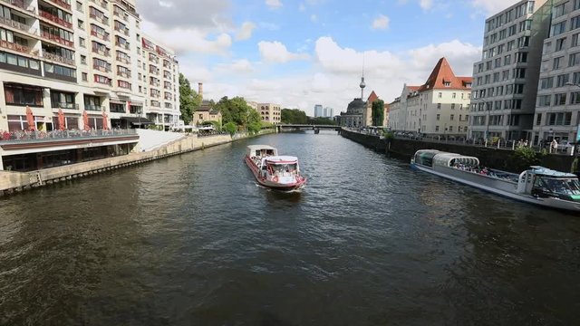 Berlin city skyline at Museum island and Berlin TV Tower, Tourist ship on River Spree, Bode Museum on Museum Island with TV Tower in background, Germany, Berlin, September, 2017
