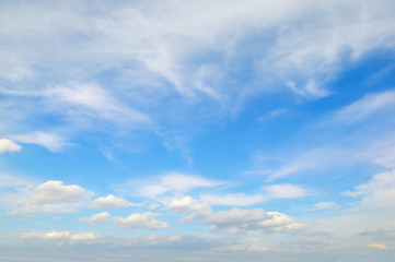 Light cirrus clouds against the blue sky.