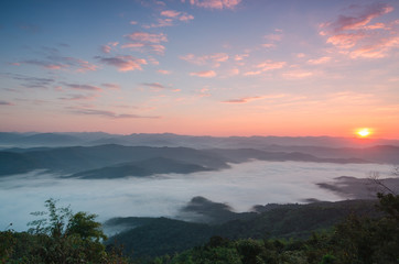 Beautiful clouds and fog among mountain landscape.