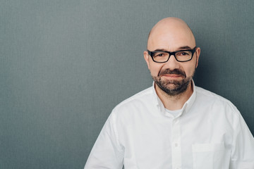 Portrait of man looking at camera with confidence