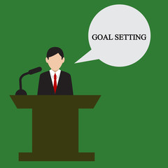 Businessman speaks. Business illustration with the inscription:goal setting