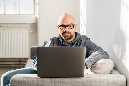 Man working at home on a laptop