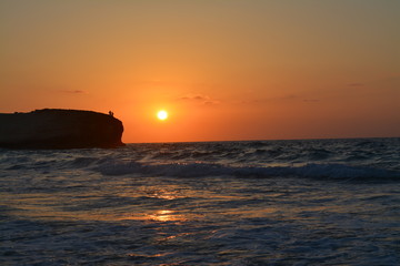 Fototapeta na wymiar Sunset behind the sea 