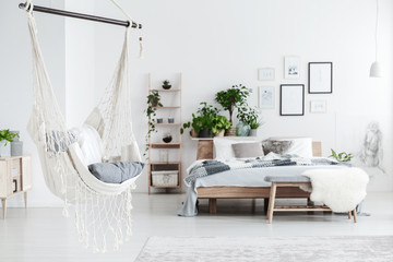 White hammock in bedroom interior
