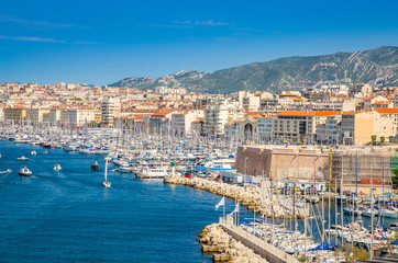 Fototapeta na wymiar Aerial view of old Vieux port and coast in Marseille, France
